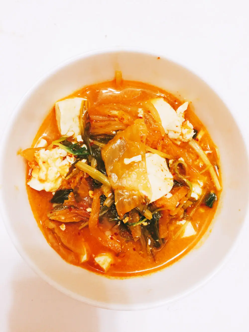 Kimchi soup with mizuna and tofu
