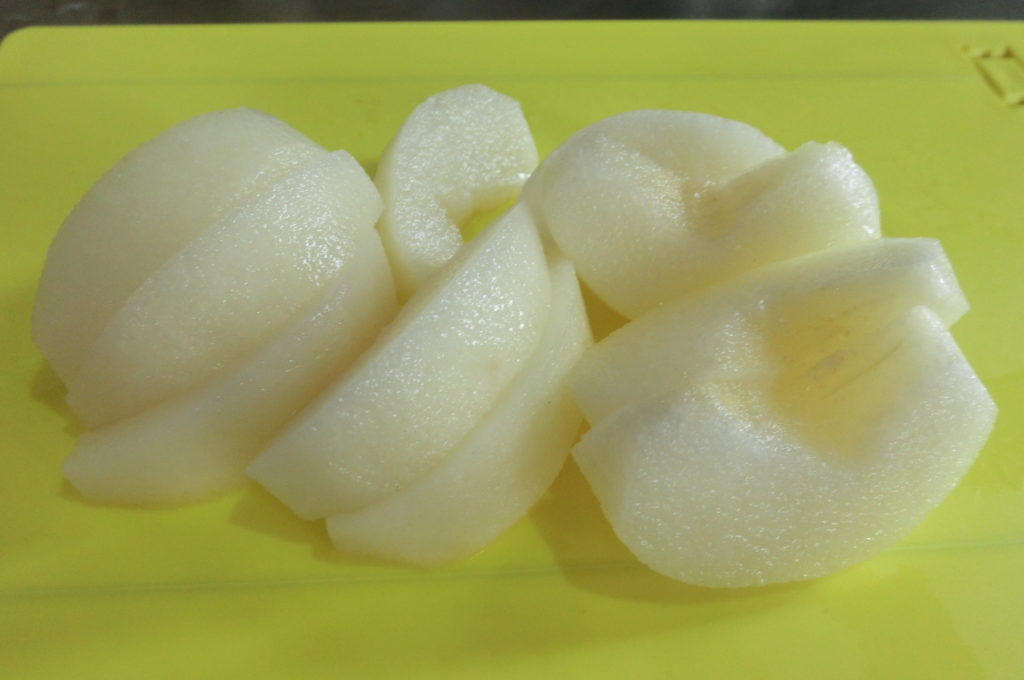 Peel and cut the pear