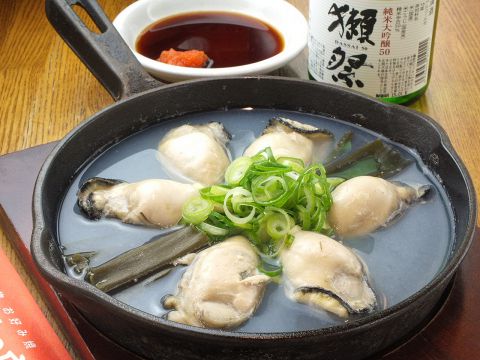 Frozen oysters steamed in sake