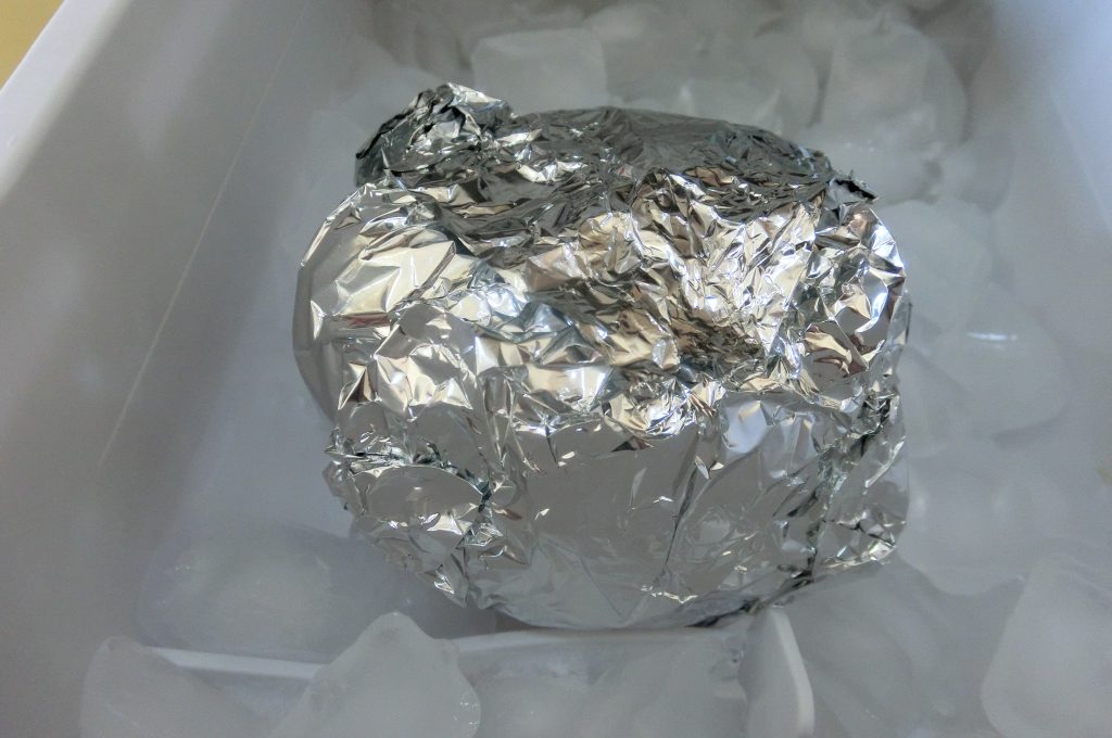 Wrap apple in aluminum foil