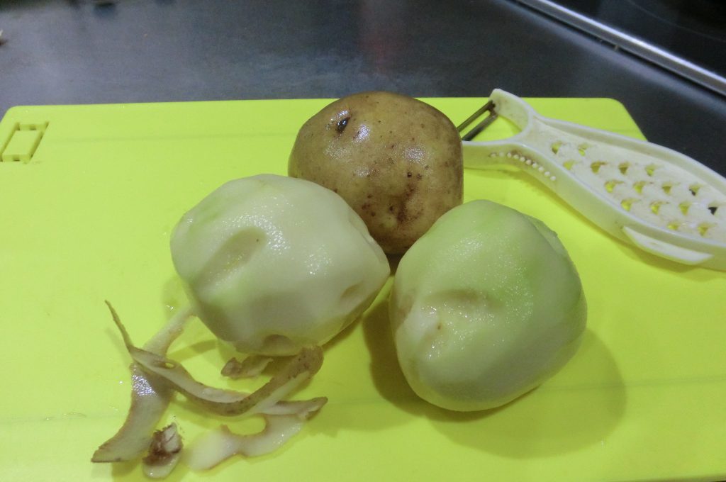 Washed and peeled potatoes