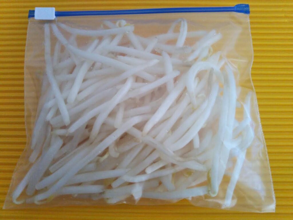 Freeze heated bean sprouts